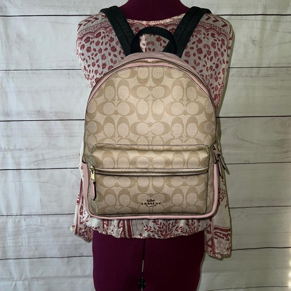 Coach Handbags - Coach Medium Charlie Backpack  in Signature Canvas Monogram Pink
